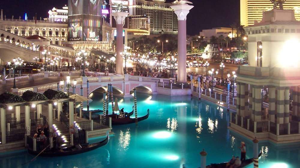 Gondolas at the Venetian Hotel Las Vegas Gondolas taking Tourists Through the Canals at the Venetian Hotel Las Vegas